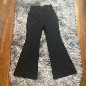Black crossover flared leggings